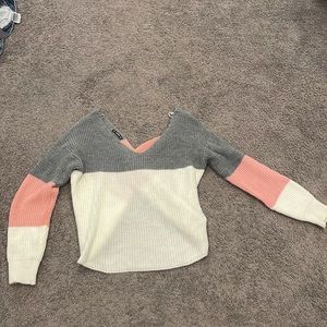 Pink, white, and gray sweater
